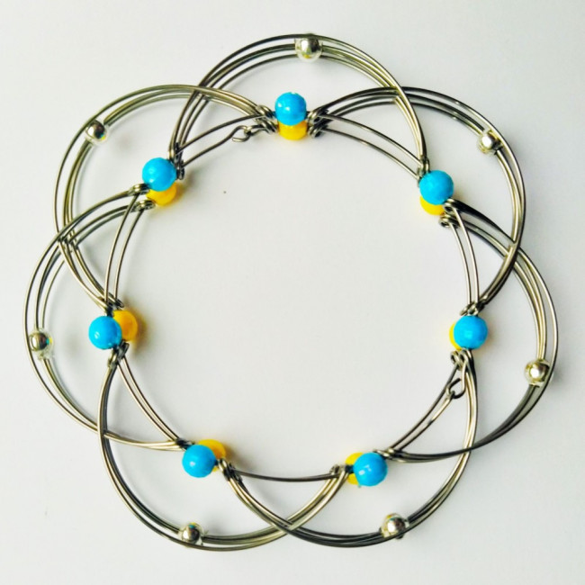 Развивающая антистресс игрушка «МЕТАМОРФОЗА 5 в 1» пластик сине-желтая Развивающая антистресс игрушка «МЕТАМОРФОЗА 5 в 1» пластик сине-желтая